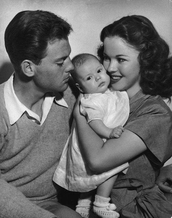 Temple at the age of 20><br>  Shirley Temple with her families at the age of 20, 1948<br>  <img src=